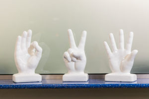 Three hand statues